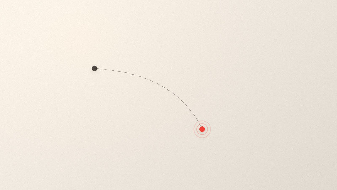 A dashed arc curving from a small dark point to a red one further away.